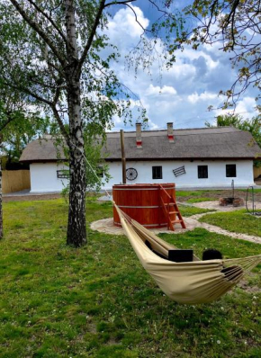 A Nádtetős Parasztházak